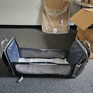 Xinsilu diaper backpack with built in changing station